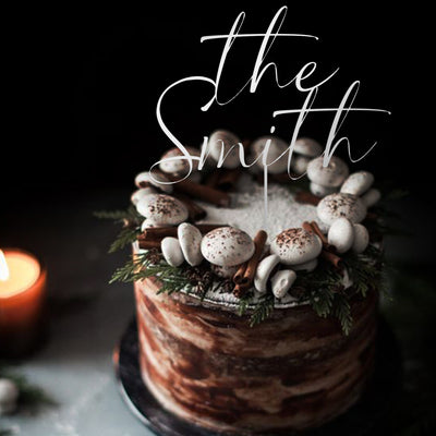 A Symbol of Our Love: Personalized Cake Topper with Last Name and Date to Grace Our Wedding Cake